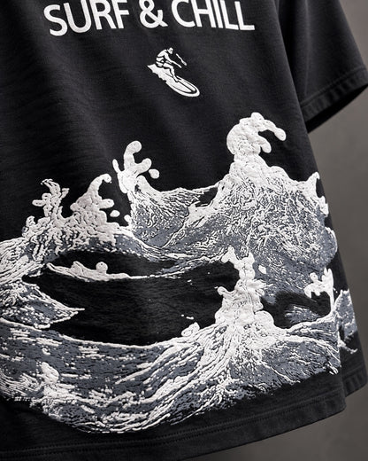 Surf & Chill black T-shirt – raised wave print detail